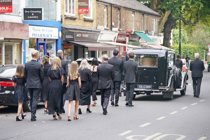 The funeral procession for Dame Deborah James arrives at St Mary's Church in Barnes, west London