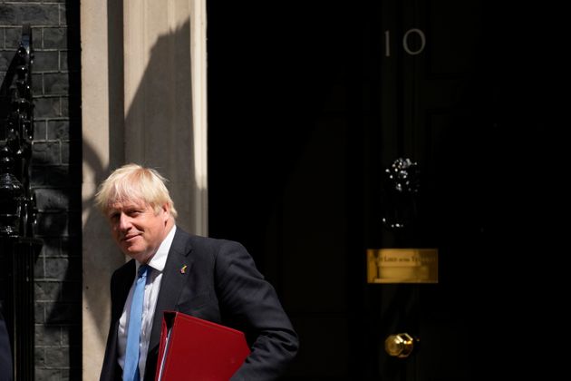 British Prime Minister Boris Johnson leaves 10 Downing Street, in London, to attend the weekly Prime Minister's Questions at the Houses of Parliament, Wednesday, July 20, 2022. The fractious race to replace Boris Johnson as Britain's prime minister entered an unpredictable endgame Tuesday as three candidates for Conservative Party leader were left battling for the two spots in a run-off vote. (AP Photo/Matt Dunham)