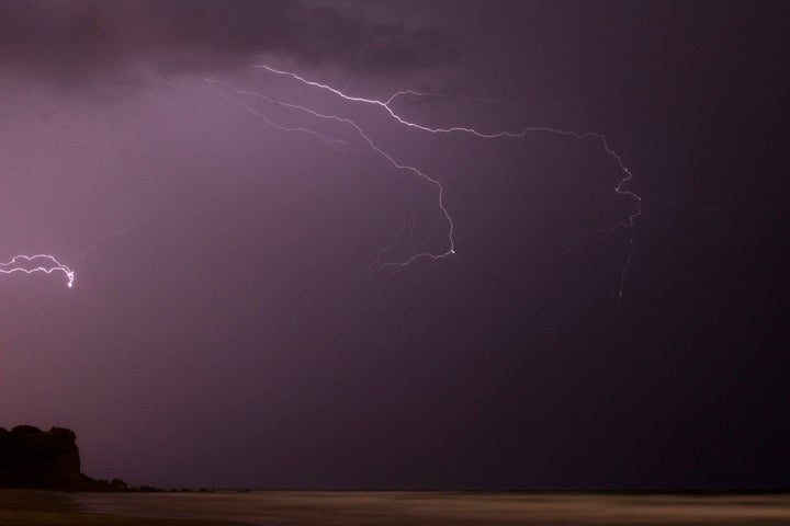 Lightning strikes over the Mediterranean Sea in Hadera, Israel, Friday, Nov. 20, 2020. (AP Photo/Ariel Schalit)