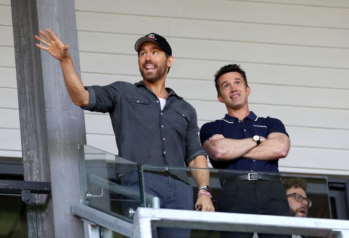 Reynolds and McElhenney attend the Vanarama National League semi-final at Wrexham's Racecourse Ground on May 28, 2022.