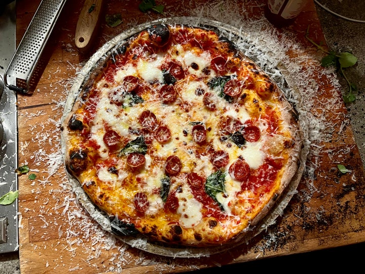 A delectable pizza made from <a href="https://www.instagram.com/pizzaquestionmark/" target="_blank" role="link" rel="sponsored" class=" js-entry-link cet-external-link" data-vars-item-name="Joe Lamberti of Philadelphia's pizza pop-up," data-vars-item-type="text" data-vars-unit-name="62d98c13e4b03dbb99168c56" data-vars-unit-type="buzz_body" data-vars-target-content-id="https://www.instagram.com/pizzaquestionmark/" data-vars-target-content-type="url" data-vars-type="web_external_link" data-vars-subunit-name="article_body" data-vars-subunit-type="component" data-vars-position-in-subunit="0">Joe Lamberti of Philadelphia's pizza pop-up,</a><br><a href="https://www.instagram.com/pizzaquestionmark/" target="_blank" role="link" rel="sponsored" class=" js-entry-link cet-external-link" data-vars-item-name="?izza" data-vars-item-type="text" data-vars-unit-name="62d98c13e4b03dbb99168c56" data-vars-unit-type="buzz_body" data-vars-target-content-id="https://www.instagram.com/pizzaquestionmark/" data-vars-target-content-type="url" data-vars-type="web_external_link" data-vars-subunit-name="article_body" data-vars-subunit-type="component" data-vars-position-in-subunit="1">?izza</a>.