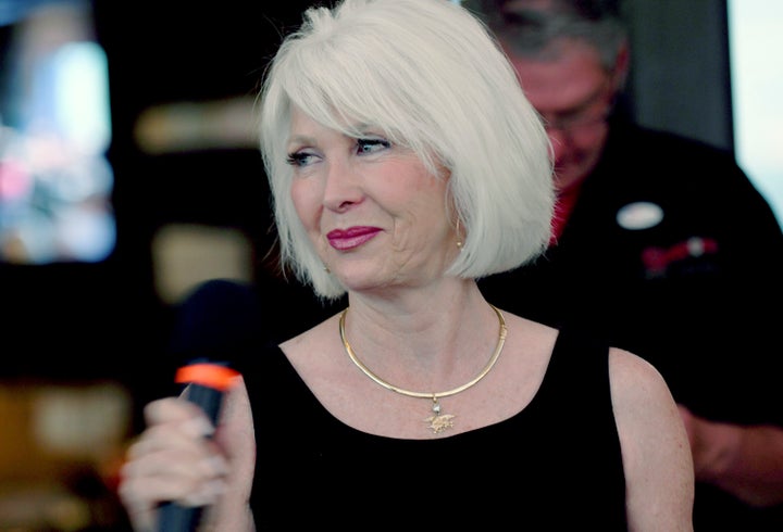 Tina Peters speaks to supporters at her election watch party in Sedalia, Colo., on June 28, 2022. A new arrest warrant was issued on July 21, 2022, for Mesa County Clerk Peters, less than a week after the embattled official convinced a judge not to send her back to jail for improperly traveling out of state while awaiting trial on felony charges.