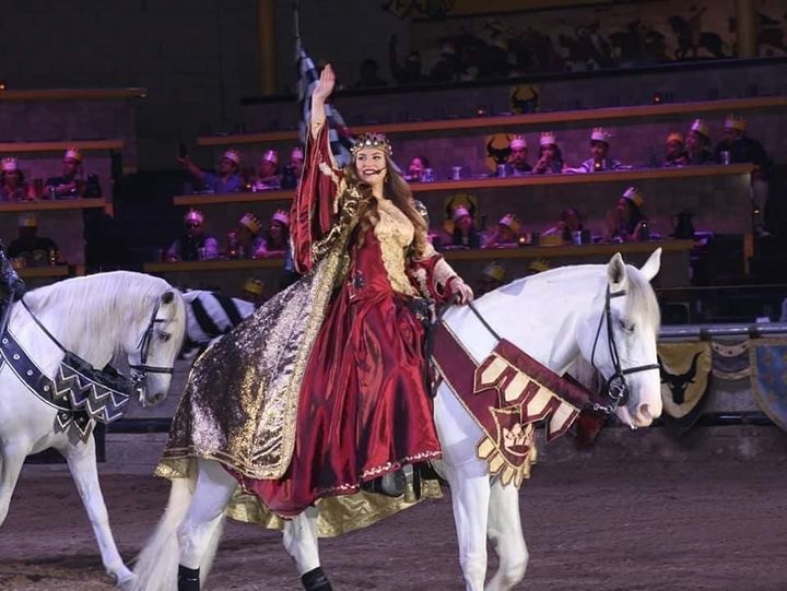 Julia McCurdie playing the queen at Medieval Times.