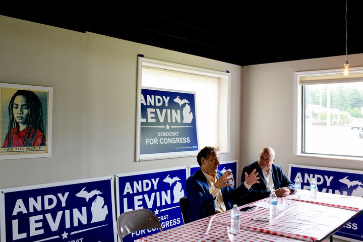 Rep. Andy Levin (D-Mich.), left, and Rep. Mark Pocan (D-Wis.) called on Rep. Stevens, Levin's opponent, to renounce support from a pro-Israel super PAC on Friday.