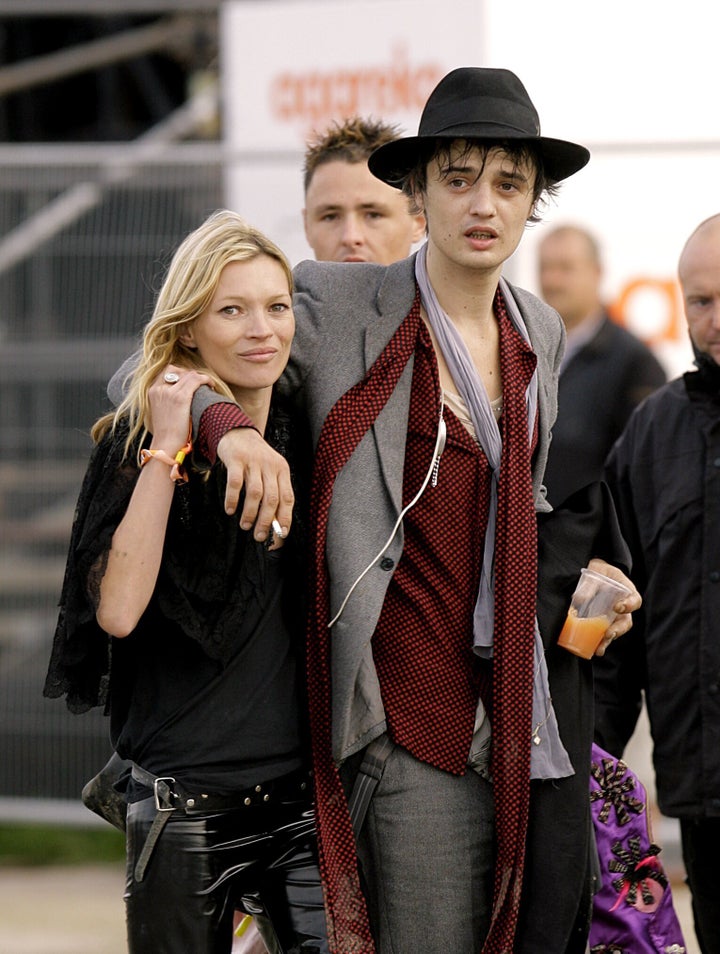 Kate Moss and Pete Doherty at the 2007 Glastonbury Festival at Worthy Farm in Pilton, Somerset. (Photo by Yui Mok - PA Images/PA Images via Getty Images)