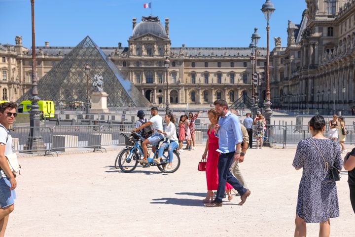 Jennifer Lopez and Ben Affleck are seen strolling near the Louvre Museum.