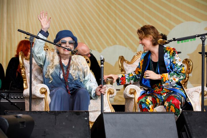 Joni Mitchell (left) and Brandi Carlile perform at the 2022 Newport Folk Festival. 