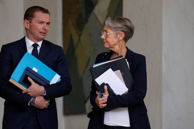 Le ministre du Travail, du Plein emploi et de l'Insertion, Olivier Dussopt et la Première ministre Élisabeth Borne, à la sortie de l'Élysée le 14 juin 2022.