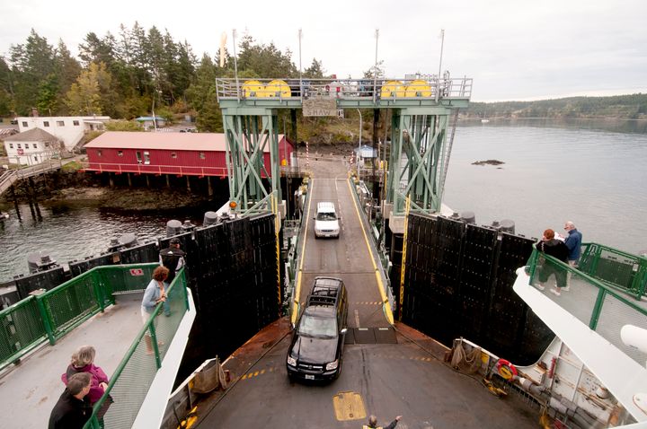 Automobiles board an inter-island car ferry en route to the mainland on Shaw Island in the San Juan Islands.