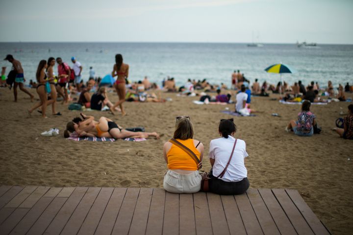 TSpain’s government has a message for women who are uncomfortable about their bodies when they wear bathing costumes: Don’t be.(AP Photo/Francisco Seco)