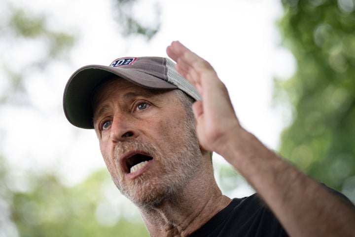 WASHINGTON, DC - JULY 28: Jon Stewart speaks to the press before a news conference about the Honoring Our Promise to Address Comprehensive Toxics (PACT) Act on Capitol Hill July 28, 2022 in Washington, DC. A procedural vote to advance the bill, which would expand health care access for military veterans who became ill after being exposed to toxic burn pits, failed to pass in the Senate on Wednesday. (Photo by Drew Angerer/Getty Images)