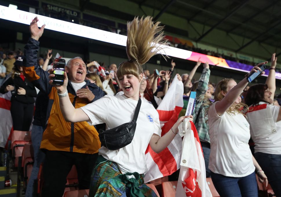 England fans celebrate the Lionesses' win against Sweden in the Euro semi-finals.