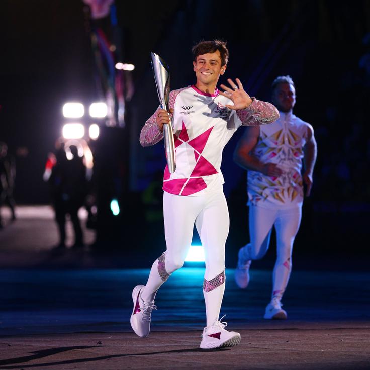 Daley carries the Queen’s Baton during the Opening Ceremony of the Birmingham 2022 Commonwealth Games on July 28 in Birmingham, England.