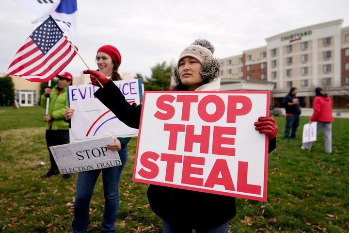 President Donald Trump's supporters gather outside of the Wyndham Hotel on Nov. 25, 2020, where the Pennsylvania State Senate Majority Policy Committee was scheduled to meet in Gettysburg.