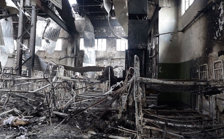 Red Cross Requests Access To Ukraine Prison After POWs Die 1 A view of destroyed barrack at a prison in Olenivka, an area in eastern Ukraine controlled by Russian-backed separatist forces, is seen on July 29.