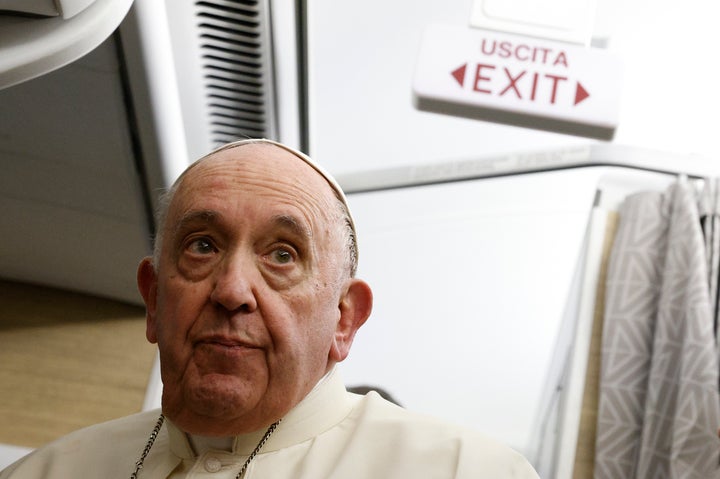Pope Francis speaks to journalists aboard the papal flight back from Canada Saturday, July 30, 2022, where he paid a six-day pastoral visit.