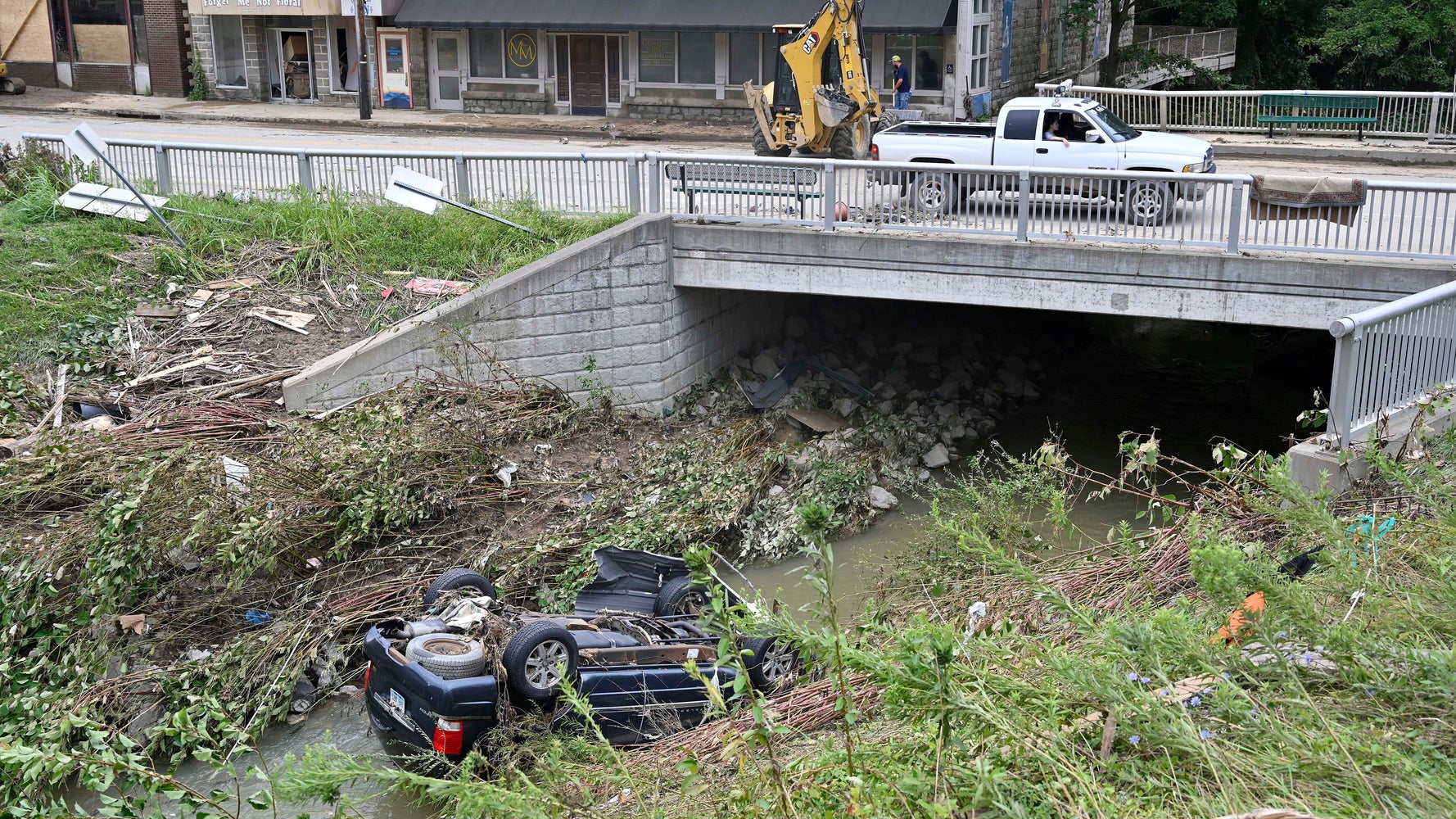 Kentucky death toll rises to 26 amid flood threat