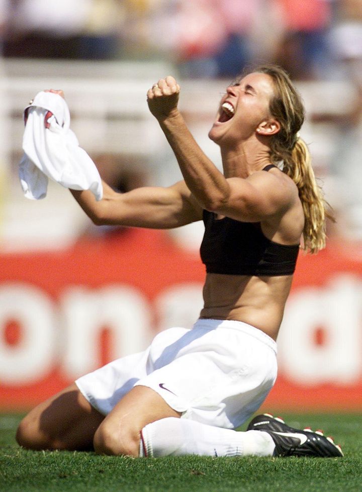 Brandi Chastain of the US celebrating her winning penalty shot in the 1999 Women's World Cup final against China 10 July 1999. 