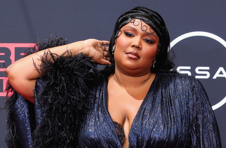 Lizzo poses on the red carpet at the BET Awards 2022.