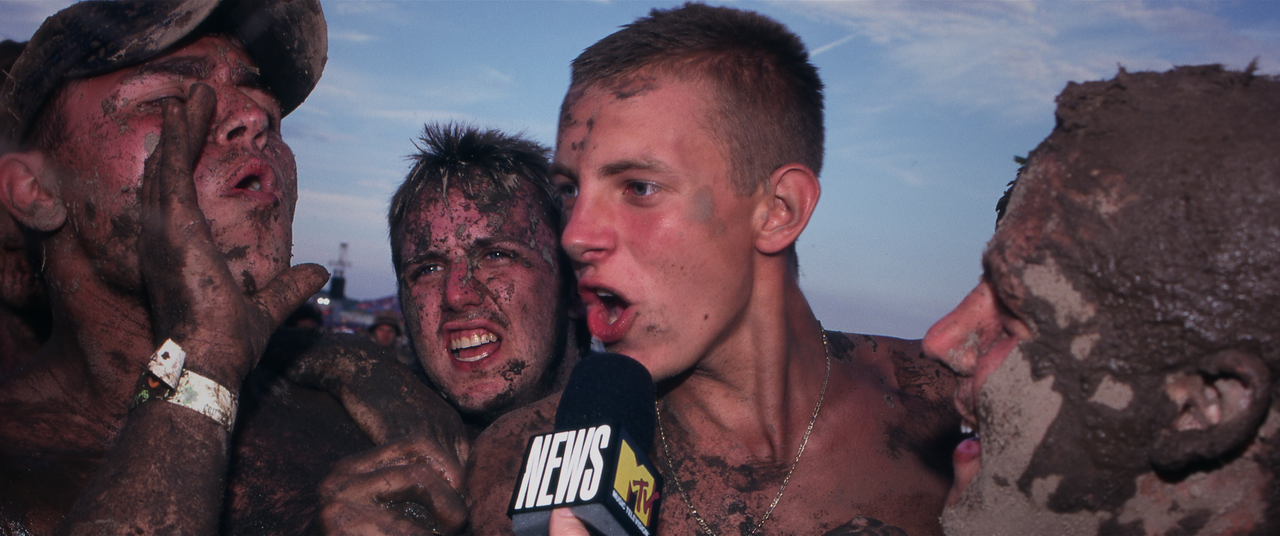 A young man eagerly talks to an MTV News reporter in footage from the festival in Rome, New York.