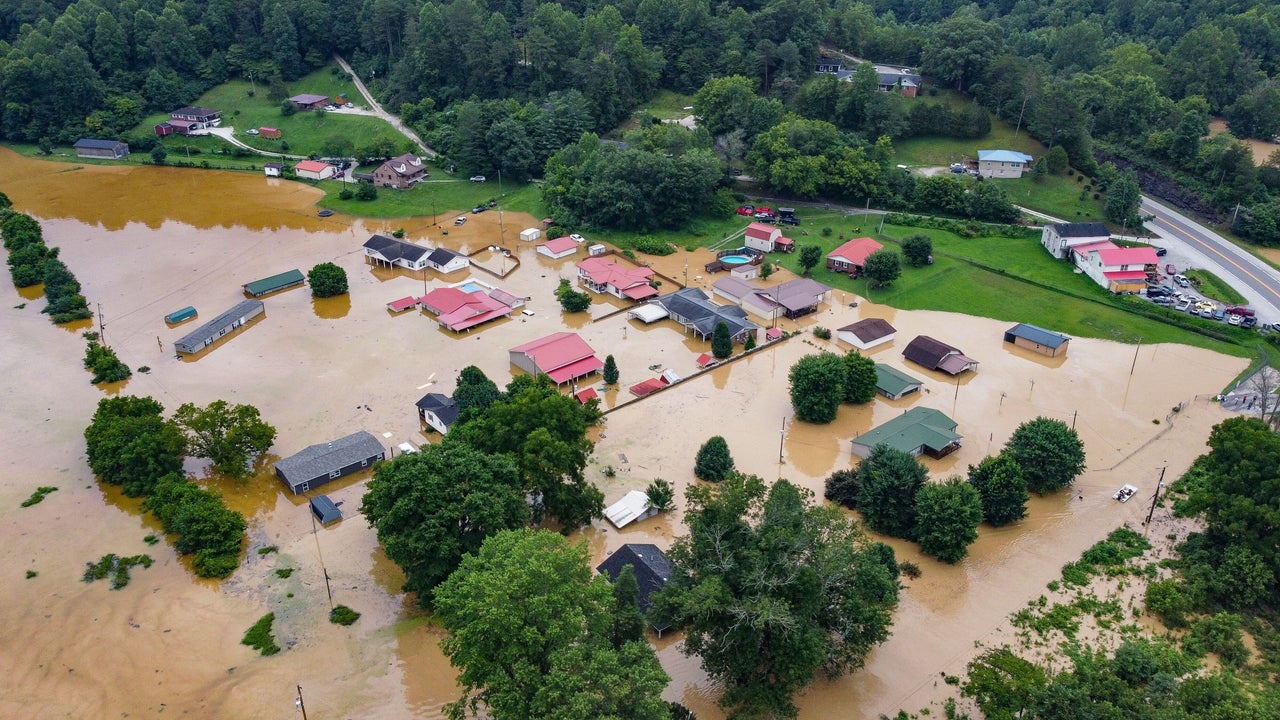 Aerial view of homes submerged under flood waters from the North Fork of the Kentucky River in Jackson, Kentucky, on July 28.