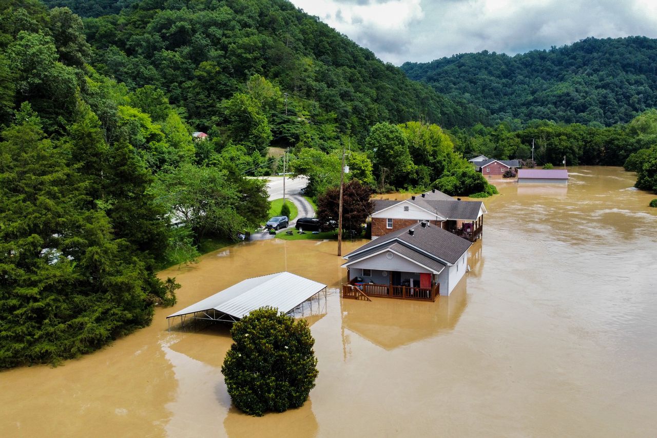 Homes along Gross Loop off of KY-15 are flooded with water from the North Fork of the Kentucky River in Jackson, Kentucky, on July 28.