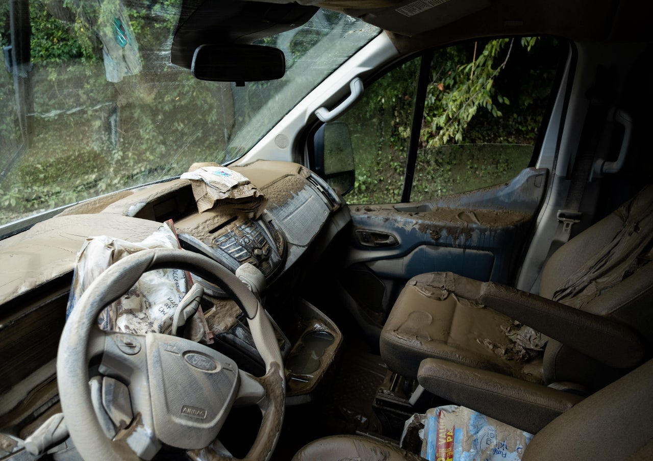 Mud is seen inside a water-damaged car in the aftermath of historic flooding in Eastern Kentucky near Jackson, Kentucky, on July 31.