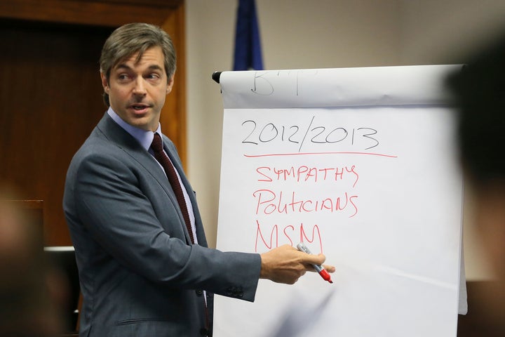 Alex Jones' lawyer Andino Reynal gives his opening statement to the jury, Tuesday, July 26, 2022, at the Travis County Courthouse in Austin, Texas. (Briana Sanchez/Austin American-Statesman via AP, Pool)