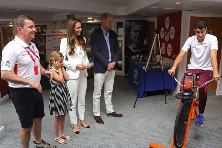 Charlotte closes her ears during a demonstration at the SportsAid House at the 2022 Commonwealth Games on Aug. 2.
