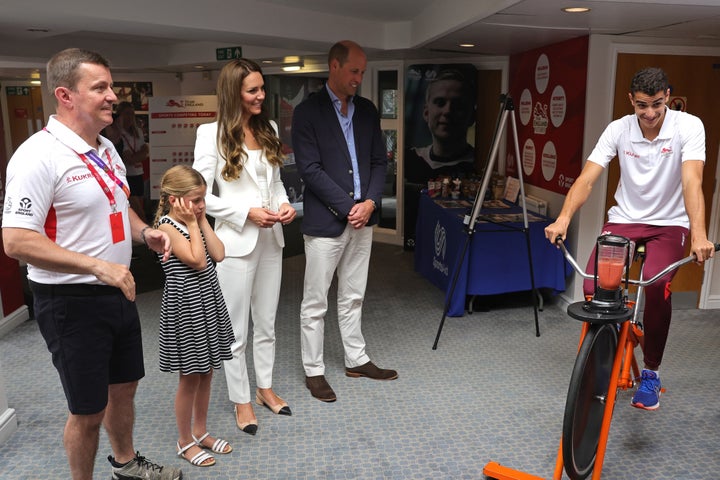 Charlotte closes her ears during a demonstration at the SportsAid House at the 2022 Commonwealth Games on Aug. 2.