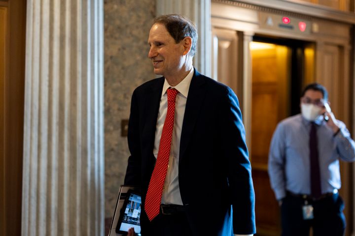 Sen. Ron Wyden said Democrats are delivering connected  promises of enactment   connected  clime  change, cause   prices, taxation  enforcement and semiconductor production.
