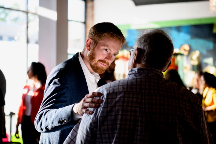 U.S. Rep. Peter Meijer (R-Mich.) speaks with potential voters before an event for the West Michigan Hispanic Chamber of Commerce in Grand Rapids on July 26.
