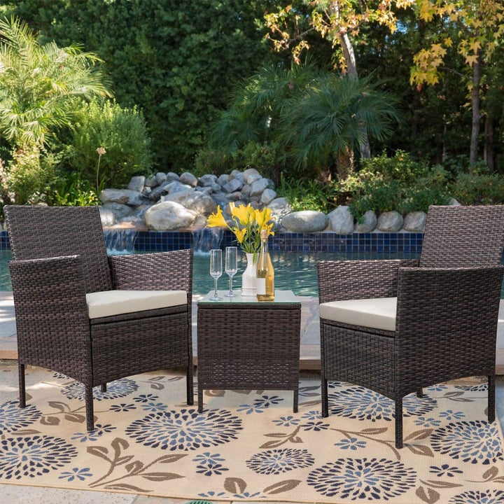An upgraded backyard space with<a href="https://www.amazon.com/dp/B0765VTBLV?tag=thehuffingtop-20&ascsubtag=62e92ccde4b0d0ea9b7b0114%2C-1%2C-1%2Cd%2C0%2C0%2Chp-fil-am%3D0%2C0%3A0%2C0%2C0%2C0" target="_blank" role="link" data-amazon-link="true" rel="sponsored" class=" js-entry-link cet-external-link" data-vars-item-name=" Devoko patio porch furniture." data-vars-item-type="text" data-vars-unit-name="62e92ccde4b0d0ea9b7b0114" data-vars-unit-type="buzz_body" data-vars-target-content-id="https://www.amazon.com/dp/B0765VTBLV?tag=thehuffingtop-20&ascsubtag=62e92ccde4b0d0ea9b7b0114%2C-1%2C-1%2Cd%2C0%2C0%2Chp-fil-am%3D0%2C0%3A0%2C0%2C0%2C0" data-vars-target-content-type="url" data-vars-type="web_external_link" data-vars-subunit-name="article_body" data-vars-subunit-type="component" data-vars-position-in-subunit="0"> Devoko patio porch furniture.</a>