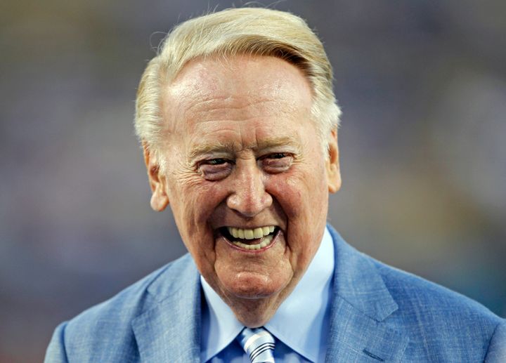 Hall of Fame broadcaster Vin Scully, whose dulcet tones provided the soundtrack of summer while entertaining and informing Dodgers fans in Brooklyn and Los Angeles for 67 years, died Tuesday night at 94.