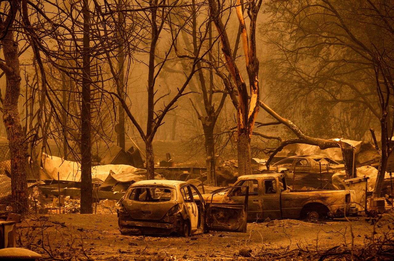 Scorched vehicles and housing line Oaks Mobile Home Park in the Klamath River community, following the burning of the McKinney Fire in Klamath National Forest.