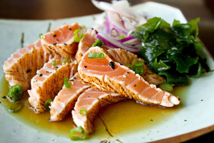 Salmon tataki is lightly seared on the outside and nearly raw on the inside, so it's imperative that you buy sushi-grade salmon.