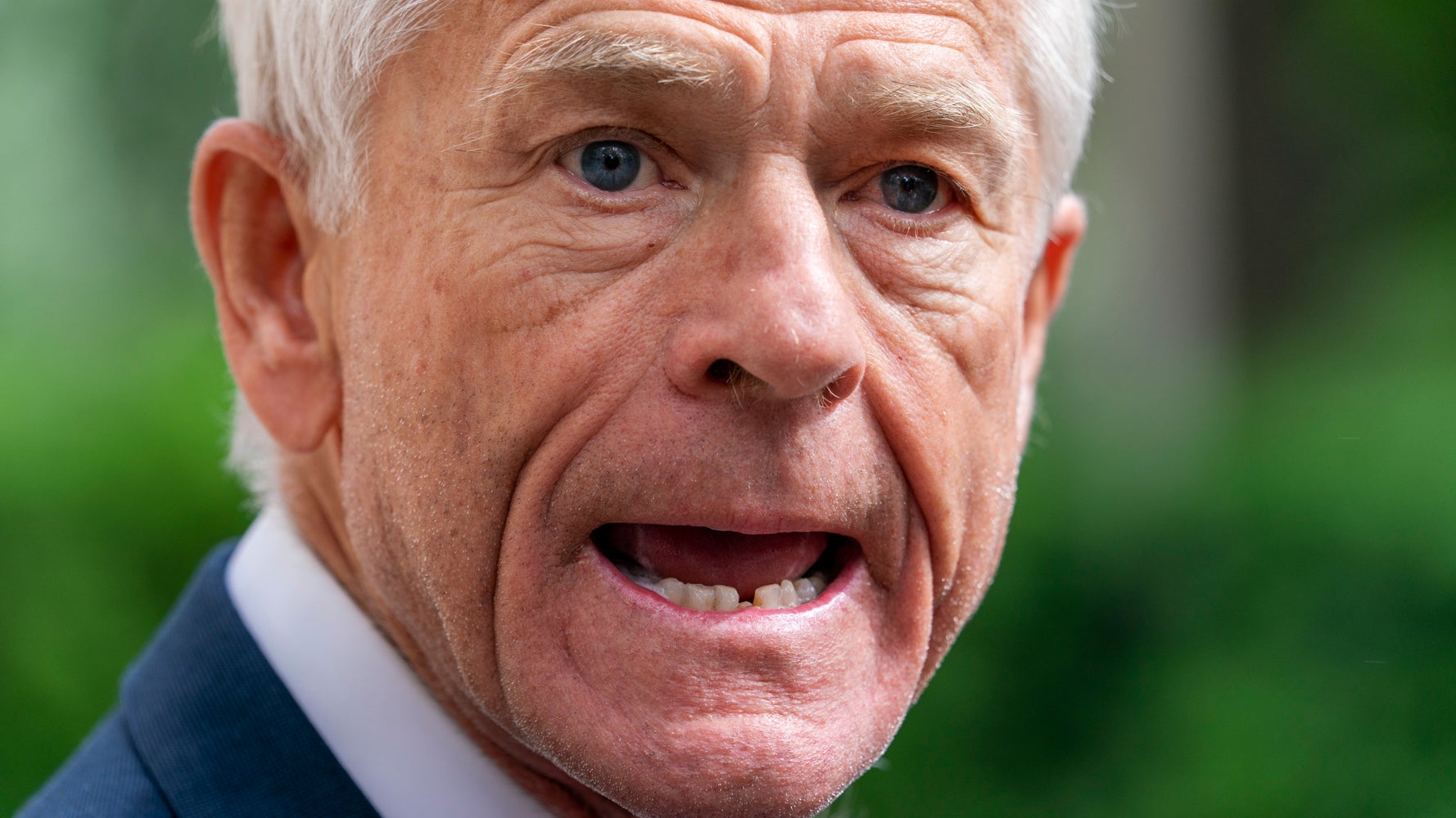 DOJ sues Trump aide Peter Navarro for alleged unofficial email account