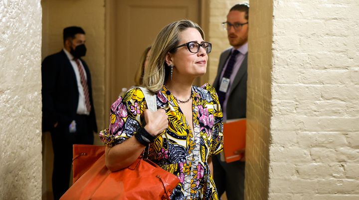 Sen. Kyrsten Sinema (D-Ariz.) leaves her office to walk to the Senate Chambers in the U.S. Capitol Building on Aug. 2 in Washington, D.C.