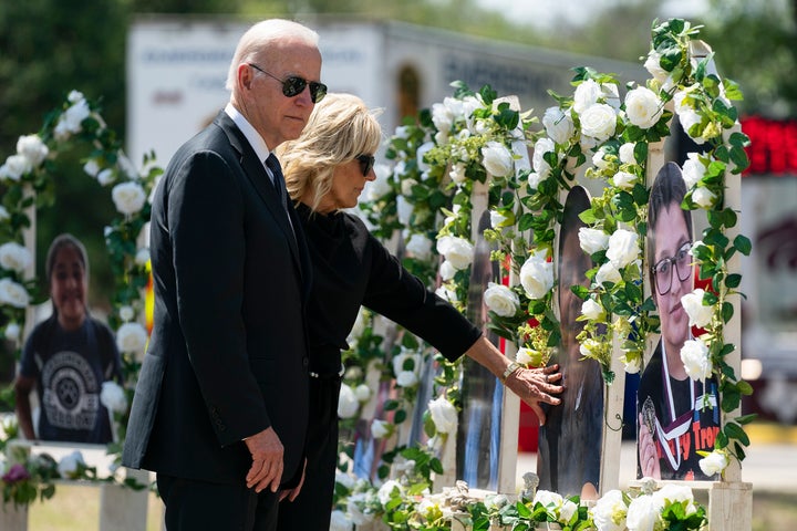 President Joe Biden and first lady Jill Biden visit a memorial at Robb Elementary School to pay their respects to the victims of the mass shooting May 29, 2022, in Uvalde, Texas.