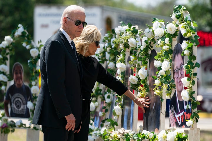 President Joe Biden and first lady Jill Biden visit a memorial at Robb Elementary School to pay their respects to the victims of the mass shooting May 29, 2022, in Uvalde, Texas. 