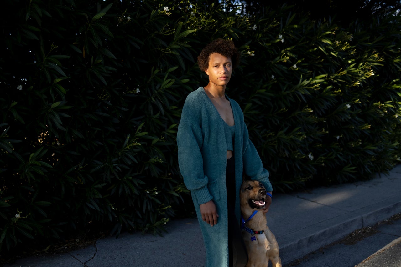 Scally with her dog at home in Belmont, California.