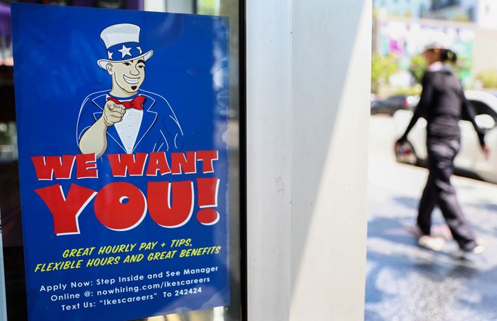 LOS ANGELES, CALIFORNIA - JULY 26: A 'We Want You!' sign is posted at an Ike's Love & Sandwiches store on July 26, 2022 in Los Angeles, California. As the Federal Reserve continues to increase interest rates, the labor market is starting to show signs of slowing down. (Photo by Mario Tama/Getty Images)