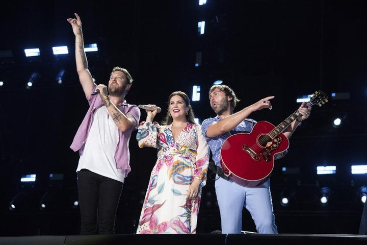 Charles Kelley, from left, Hillary Scott, and Dave Haywood of Lady A perform during CMA Fest 2022 in Nashville, Tenn., on June 12.