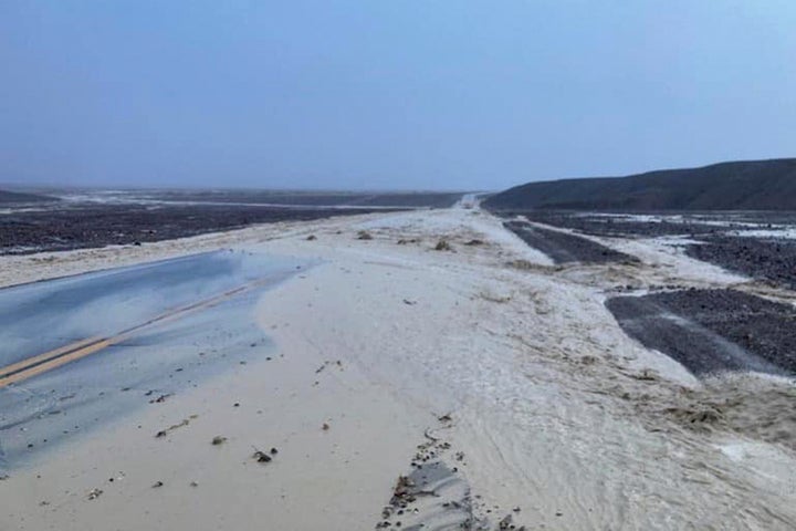 In this photo provided by the National Park Service, Highway 190 is closed due to flash flooding in Death Valley National Park, Calif., Friday, Aug. 5, 2022. Heavy rainfall triggered flash flooding that closed several roads in Death Valley National Park on Friday near the California-Nevada line. 