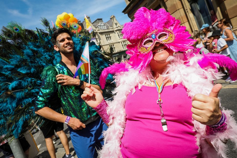 BRIGHTON, ENGLAND - AUGUST 06: Festival goers participate in the Pride LGBTQ+ Community Parade – ‘Love, Protest & Unity’ during Brighton Pride on August 06, 2022 in Brighton, England. (Photo by Tristan Fewings/Getty Images)