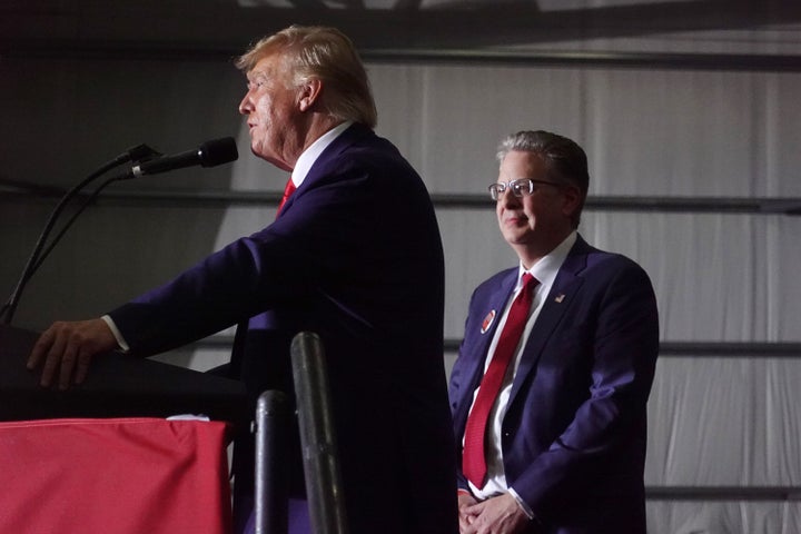 Former President Donald Trump endorses Matthew DePerno (R), who is running for the Michigan Republican party's nomination for state attorney general, during a rally on April 2, 2022, near Washington, Michigan.