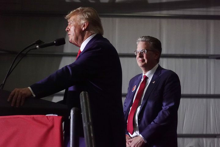 Former President Donald Trump endorses Matthew DePerno (R), who is running for the Michigan Republican party's nomination for state attorney general, during a rally on April 2, 2022, near Washington, Michigan. 