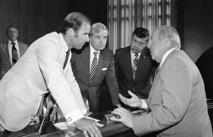 In this July 13, 1982, file photo Secretary of State designate George Shultz, right, speaks with members of the Senate Foreign Relations Committee prior to the start of the afternoon session of the panel on Capitol Hill in Washington. From left, Sen. Joseph Biden, D-Del.; Sen. Charles Percy, R-Ill., chairman of the panel and Sen. Edward Zorinsky, D-Neb. (AP Photo/Ira Schwarz, File)