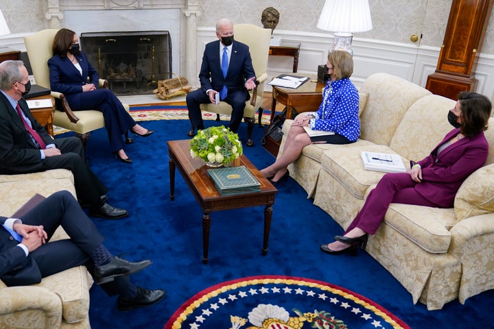 President Joe Biden speaks during a meeting in the Oval Office of the White House, May 13, 2021, in Washington. From left, Secretary of Transportation Secretary Pete Buttigieg, Sen. Mike Crapo, R-Idaho, Vice President Kamala Harris, Biden, Sen. Shelley Moore Capito, R-W.Va., and Commerce Secretary Gina Raimondo. (AP Photo/Evan Vucci, File)