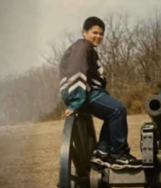 The author sitting on a cannon at Gettysburg Battlefield, age 11.